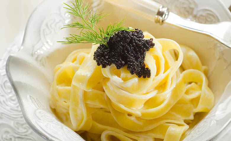 Osetra black caviar served with pasta, photo by Gourmet Food Store