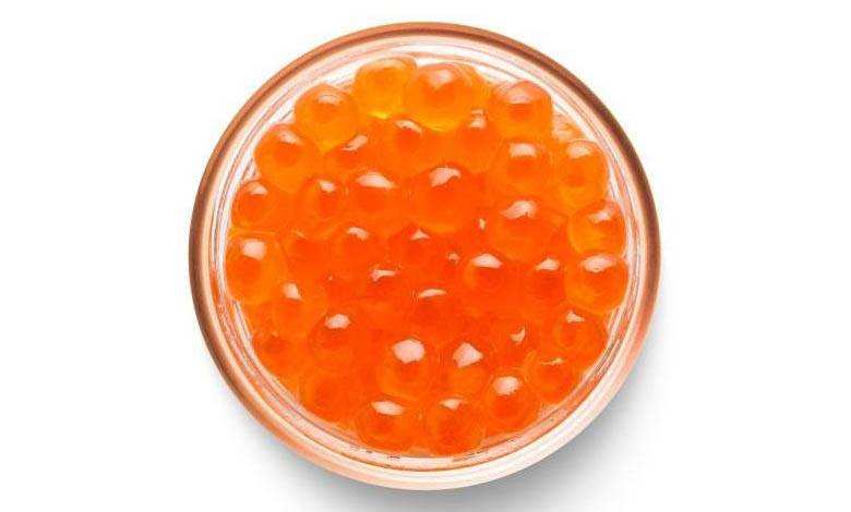 Salmon roe red caviar in a glass jar, photo by Gourmet Food Store