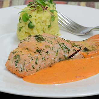Baked Salmon in a Roasted Red Pepper Cream Sauce with Saffron Risotto Recipe