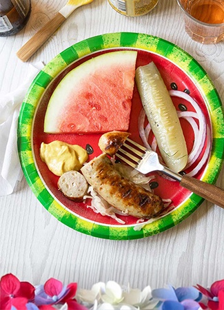  sausge and watermelon on a plate