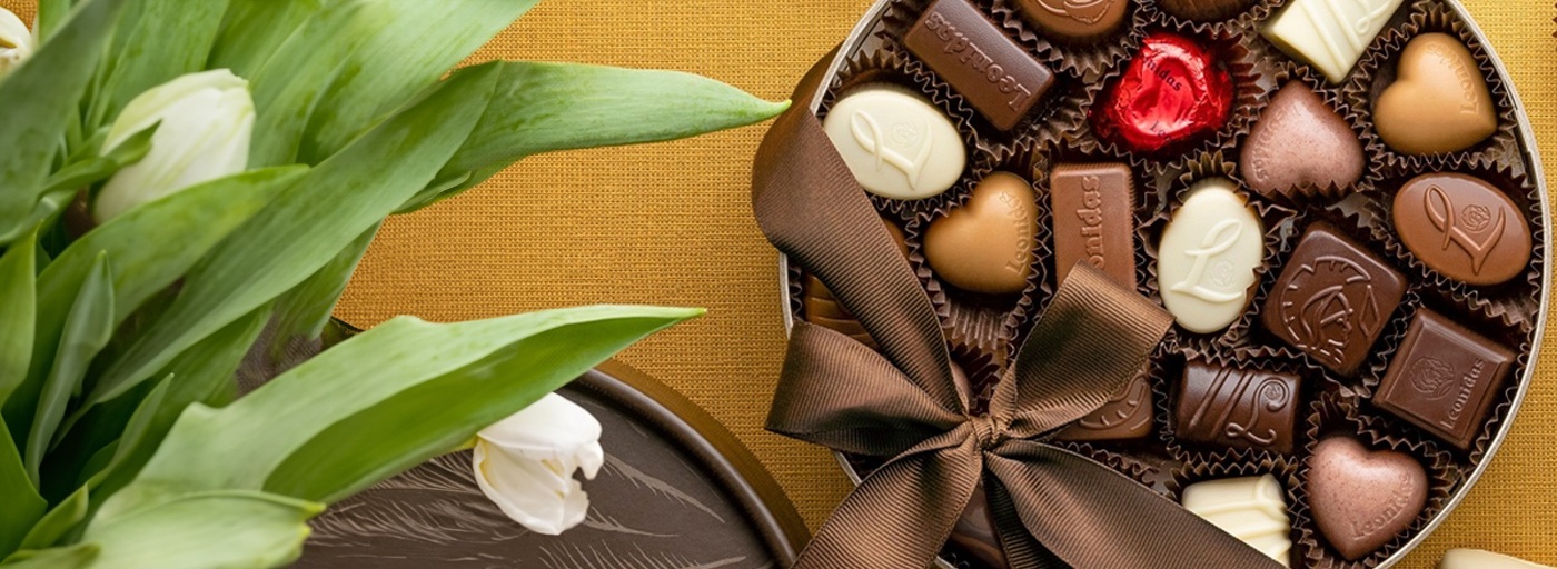 delicious chocolate bonbons in a hat box image