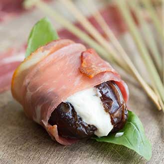 Grilled Chevre-Stuffed Dates Wrapped in Serrano Ham Recipe